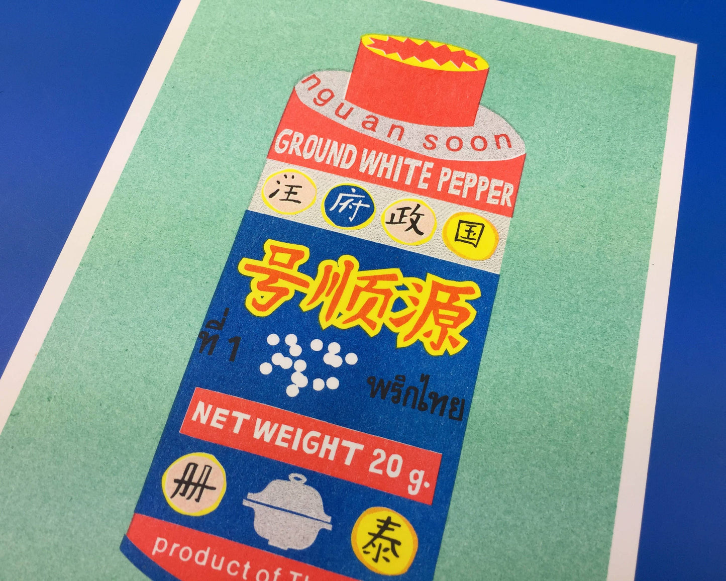 A risograph print of a can of ground white pepper