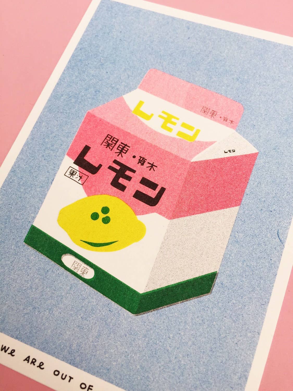 A risograph print of a box of lemon milk